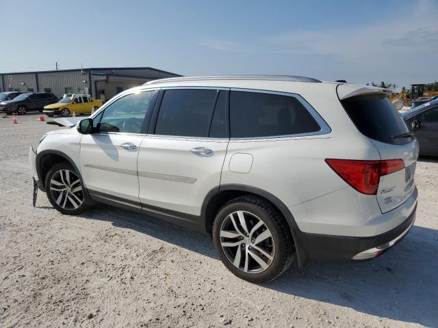 Photo 2 from auction – 2017 HONDA PILOT TOUR with VIN 5FNYF5H90HB014205