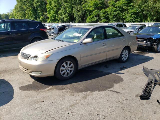 TOYOTA CAMRY LE 2003 with VIN 4T1BF30K83U060756 - Photo from auction
