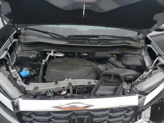 Photo 12 from auction – 2022 HONDA PASSPORT E with VIN 5FNYF8H51NB019696