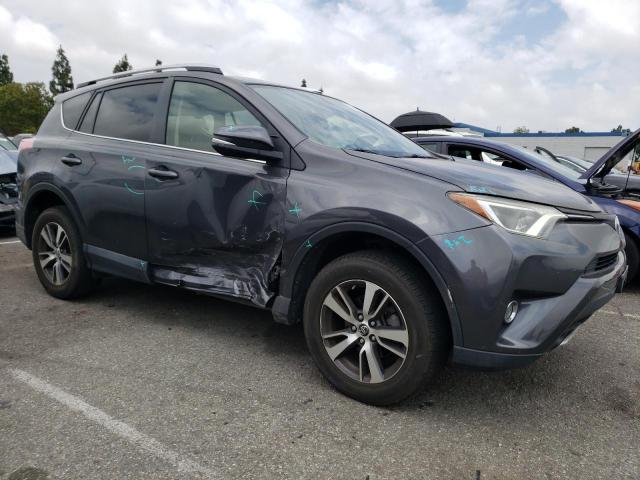 Photo 4 from auction – 2016 TOYOTA RAV4 XLE with VIN JTMWFREV0GJ095617