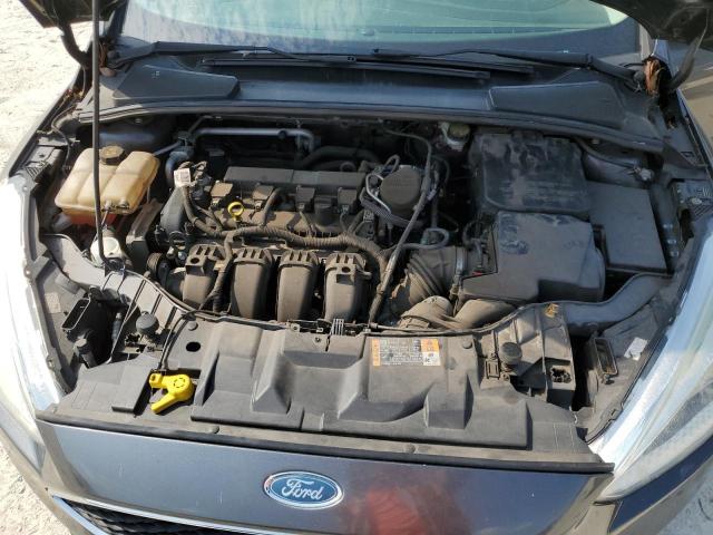Photo 11 from auction – 2015 FORD FOCUS SE with VIN 1FADP3F23FL270120