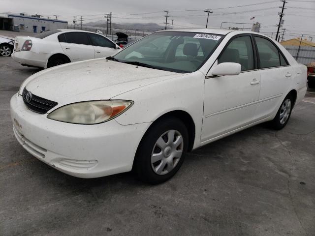 TOYOTA CAMRY LE 2002 with VIN JTDBE30K620022987 - Photo from auction