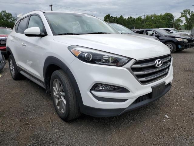 Photo 4 from auction – 2017 HYUNDAI TUCSON LIM with VIN KM8J3CA42HU569625
