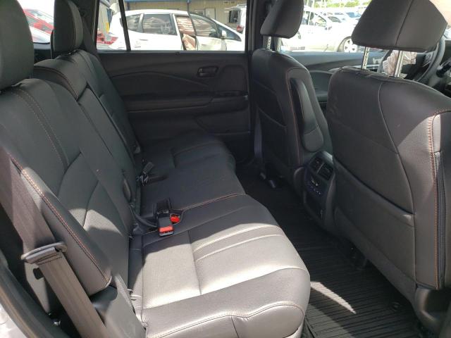 Photo 11 from auction – 2022 HONDA PILOT TRAI with VIN 5FNYF6H8XNB062898