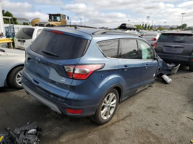 Photo 3 from auction – 2018 FORD ESCAPE SE with VIN 1FMCU9GD9JUC10696