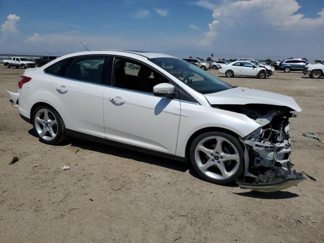 Photo 4 from auction – 2014 FORD FOCUS TITA with VIN 1FADP3J23EL303512