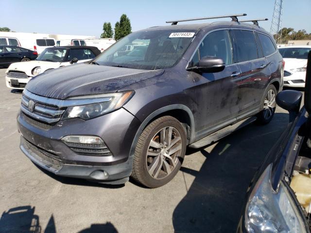 HONDA PILOT TOUR 2016 with VIN 5FNYF5H91GB033893 - Photo from auction