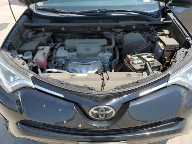 Photo 11 from auction – 2018 TOYOTA RAV4 LE with VIN 2T3BFREV7JW753814