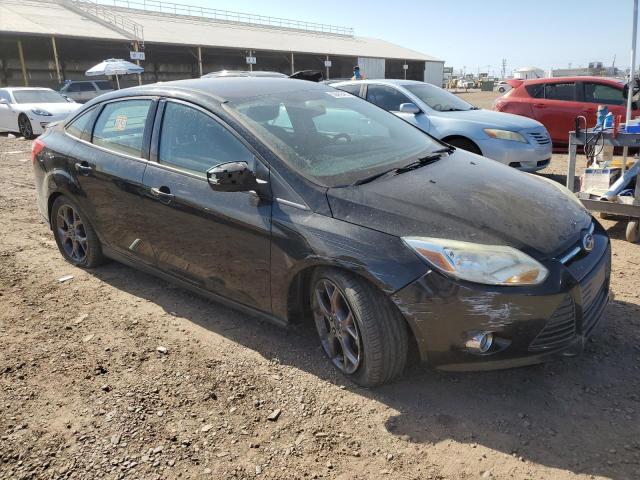 Foto 4 de la subasta – 2014 FORD FOCUS SE con VIN 1FADP3F23EL111001