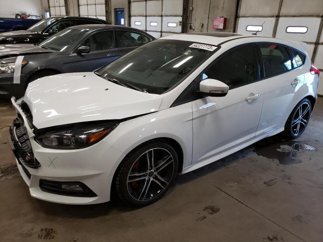 FORD FOCUS ST 2018 with VIN 1FADP3L97JL223750 - Photo from auction