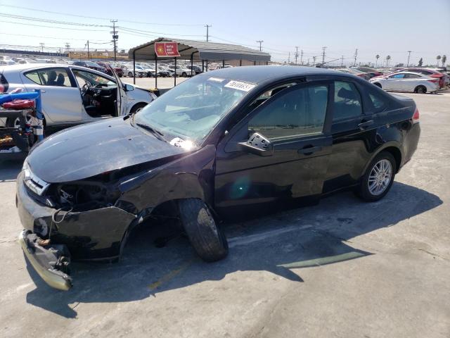 FORD FOCUS SE 2011 with VIN 1FAHP3FNXBW122521 - Photo from auction