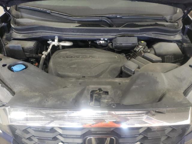 Photo 12 from auction – 2022 HONDA PASSPORT E with VIN 5FNYF8H58NB008873