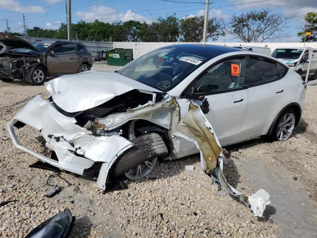 TESLA MODEL Y 2023 with VIN 7SAYGDEE0PF756503 - Photo from auction