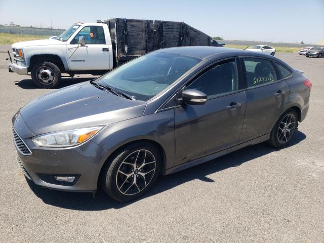 FORD FOCUS SE 2016 с VIN 1FADP3F23GL395975 - Снимка от търг