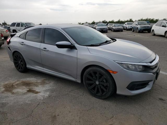 Photo 4 from auction – 2016 HONDA CIVIC LX with VIN 19XFC2F51GE211872