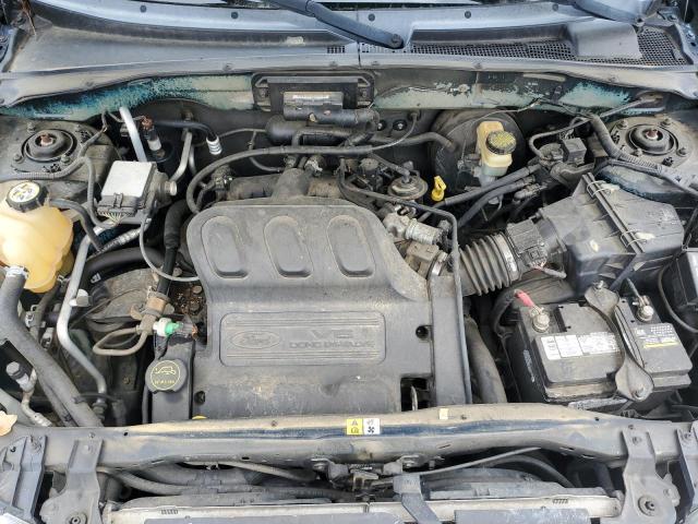 Photo 12 from auction – 2003 FORD ESCAPE XLT with VIN 1FMYU03103KE21832