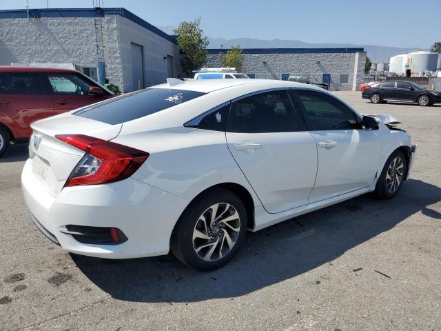 Photo 3 from auction – 2017 HONDA CIVIC EX with VIN 2HGFC2F70HH504493