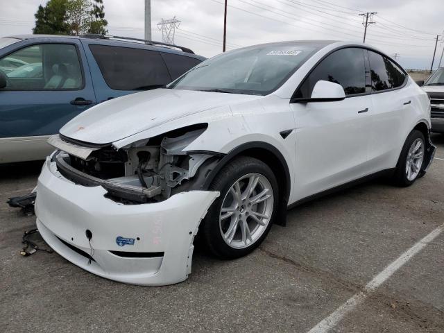 TESLA MODEL Y 2023 with VIN 7SAYGDEE5PA042170 - Photo from auction