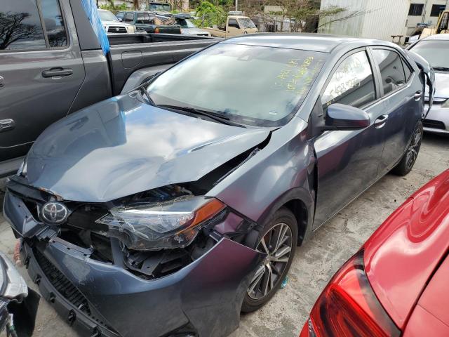 TOYOTA COROLLA L 2017 with VIN 5YFBURHE4HP637993 - Photo from auction