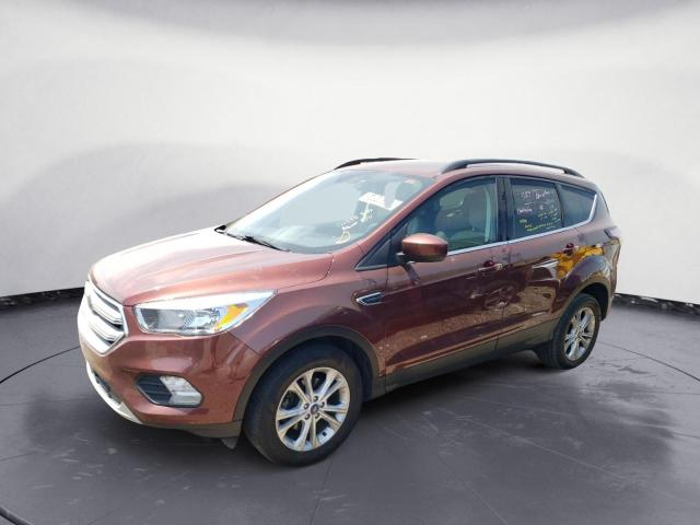 FORD ESCAPE SE 2018 with VIN 1FMCU0GD1JUC69480 - Photo from auction