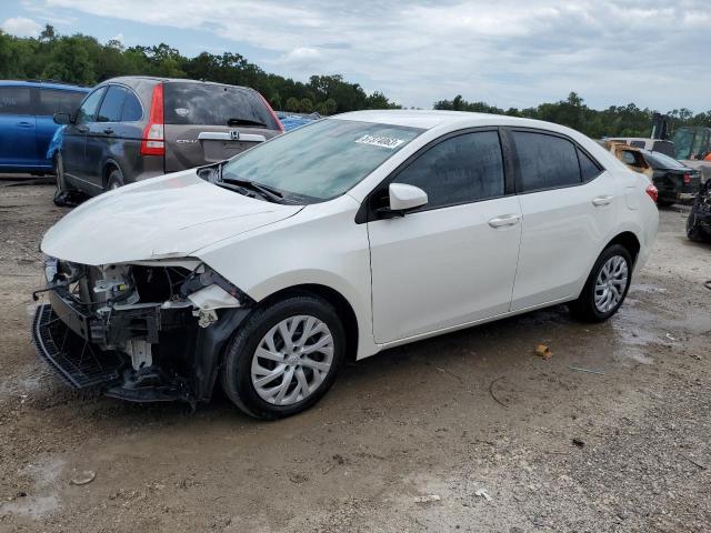 TOYOTA COROLLA L 2019 with VIN 5YFBURHE8KP875045 - Photo from auction