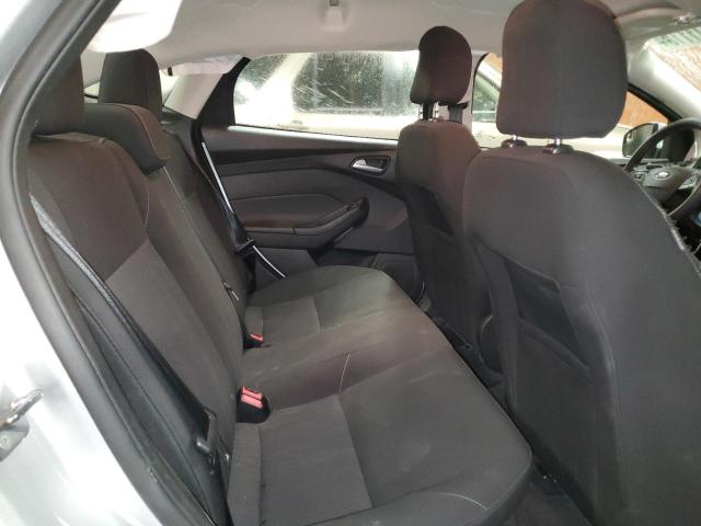 Foto 10 de la subasta – 2016 FORD FOCUS SE con VIN 1FADP3F23GL211974