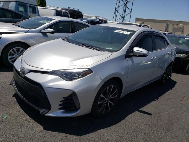 TOYOTA COROLLA L 2017 with VIN 5YFBURHEXHP690195 - Photo from auction
