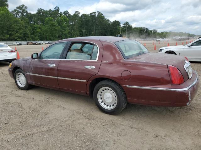 Photo 2 from auction – 2000 LINCOLN TOWN CAR E with VIN 1LNHM81W3YY770033