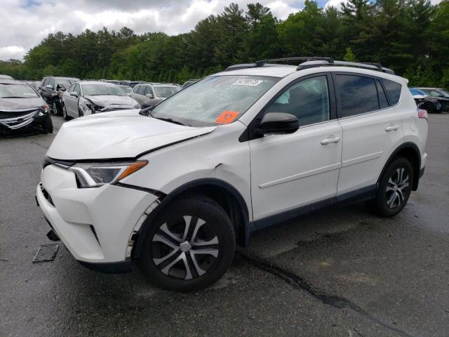 TOYOTA RAV4 LE 2018 with VIN 2T3BFREV7JW765283 - Photo from auction