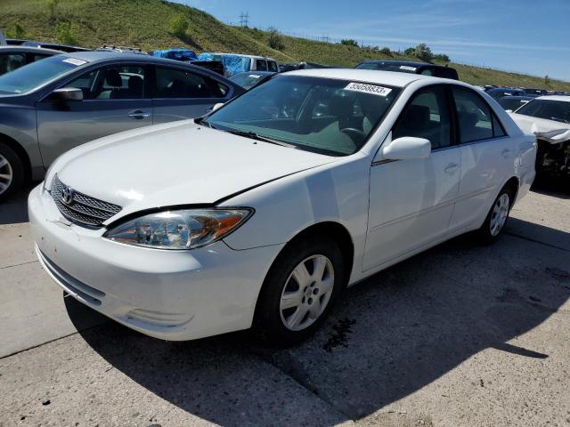 TOYOTA CAMRY LE 2002 with VIN JTDBE32K920027176 - Photo from auction