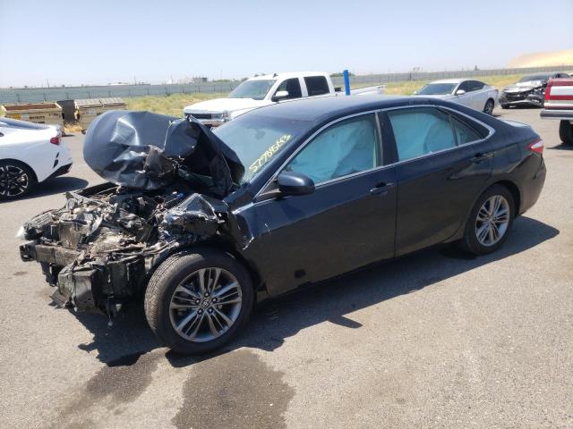 TOYOTA CAMRY LE 2017 with VIN 4T1BF1FKXHU303440 - Photo from auction