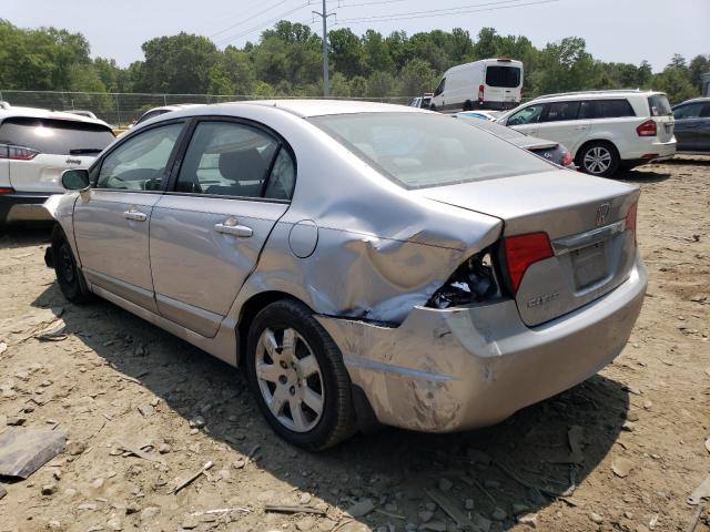 Photo 2 from auction – 2011 HONDA CIVIC LX with VIN 19XFA1F52BE011611
