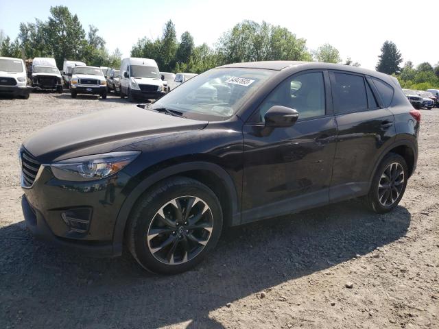 MAZDA CX-5 GT 2016 with VIN JM3KE4DY2G0681619 - Photo from auction