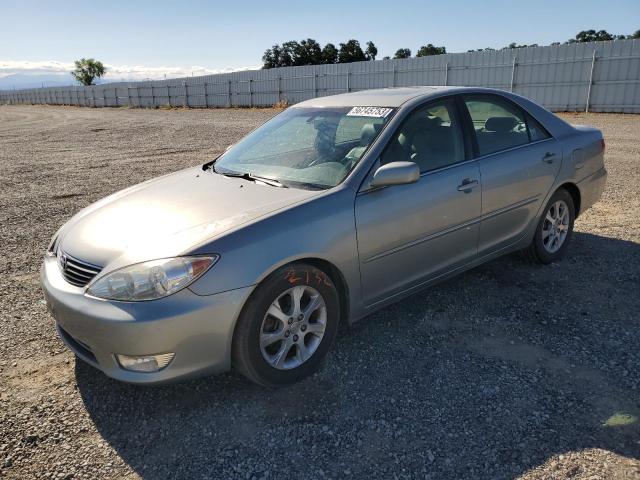 TOYOTA CAMRY LE 2005 with VIN 4T1BF30K95U602918 - Photo from auction