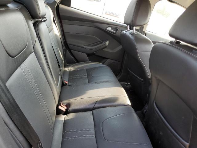 Photo 10 from auction – 2014 FORD FOCUS TITA with VIN 1FADP3J28EL228936