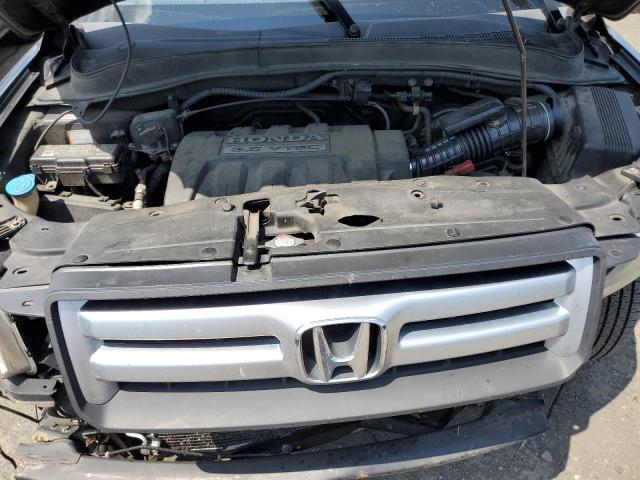 Foto 12 de la subasta – 2007 HONDA PILOT EX con VIN 2HKYF18487H502296