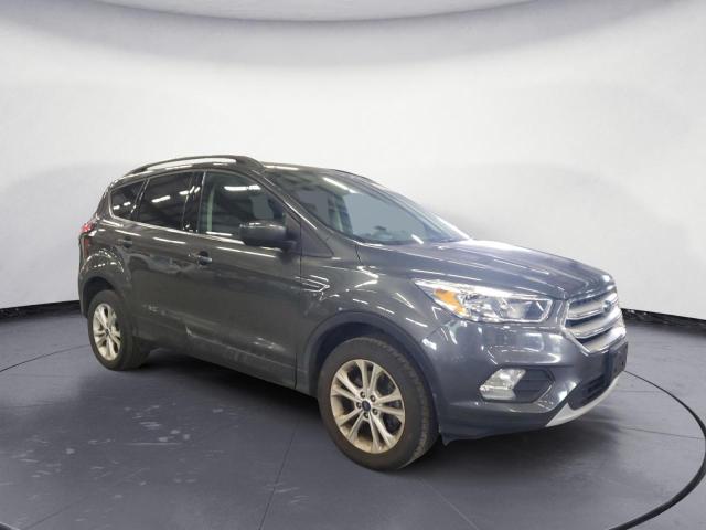 Photo 4 from auction – 2018 FORD ESCAPE SE with VIN 1FMCU9GD7JUB76130