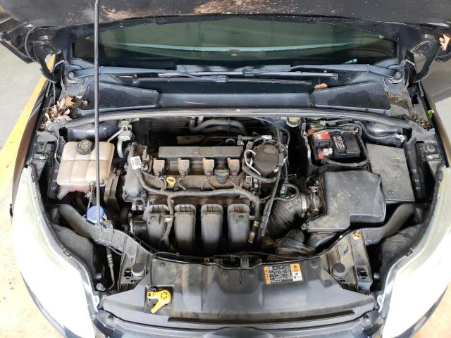 Foto 11 de la subasta – 2014 FORD FOCUS SE con VIN 1FADP3F20EL274687