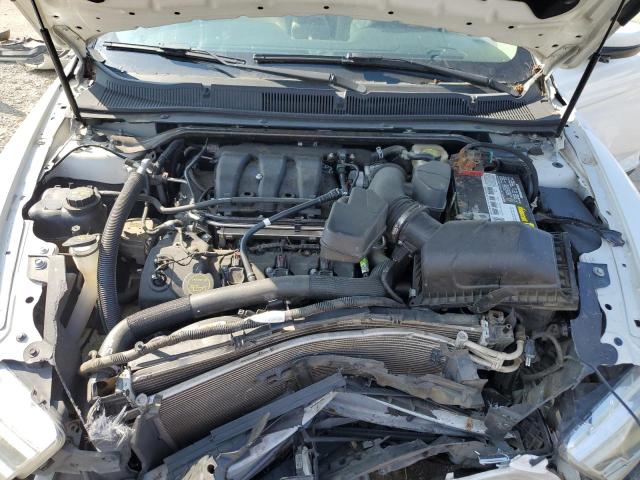 Photo 11 from auction – 2015 FORD TAURUS SEL with VIN 1FAHP2E87FG179300