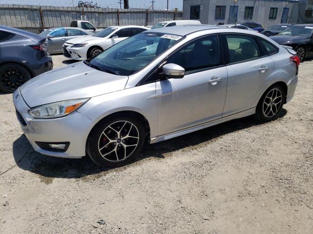 FORD FOCUS SE 2015 with VIN 1FADP3F27FL211524 - Photo from auction
