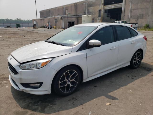 FORD FOCUS SE 2015 with VIN 1FADP3FEXFL339203 - Photo from auction