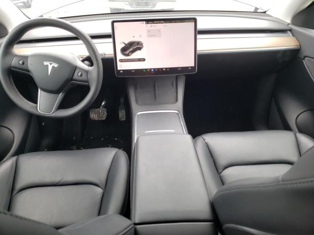 Photo 8 from auction – 2021 TESLA MODEL Y with VIN 5YJYGAEE1MF138565