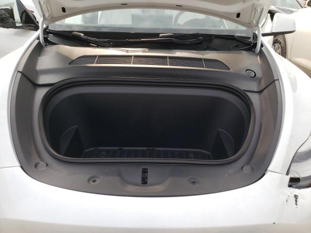 Photo 11 from auction – 2023 TESLA MODEL Y with VIN 7SAYGDEE0PA081412