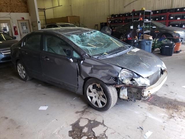 Photo 4 from auction – 2011 HONDA CIVIC LX with VIN 19XFA1F59BE044606
