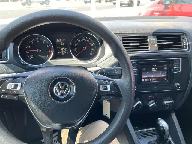 Photo 9 from auction – 2017 VOLKSWAGEN JETTA S with VIN 3VW2B7AJ5HM324649
