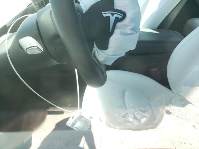 Photo 7 from auction – 2021 TESLA MODEL 3 with VIN 5YJ3E1EA8MF994393