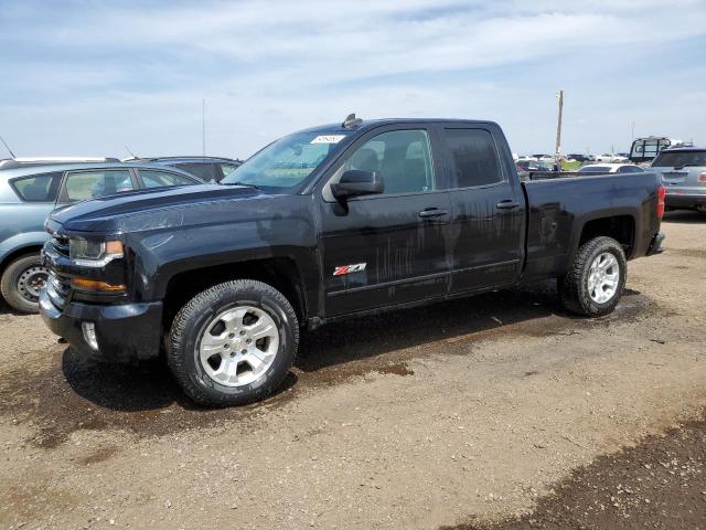 CHEVROLET SILVERADO 2018 with VIN 2GCVKREC6J1102044 - Photo from auction