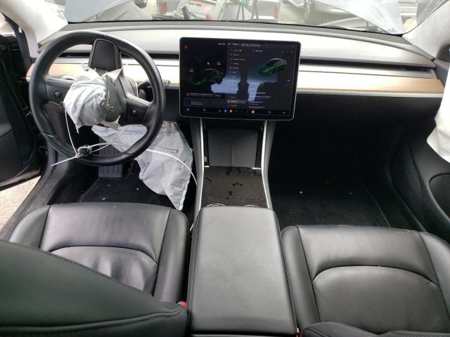 Снимка 8 от търг – 2017 TESLA MODEL 3 с VIN 5YJ3E1EAXHF002227