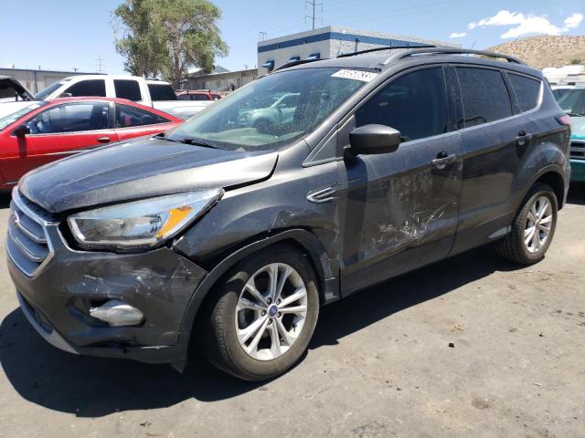 FORD ESCAPE SE 2018 with VIN 1FMCU0GD1JUC60410 - Photo from auction