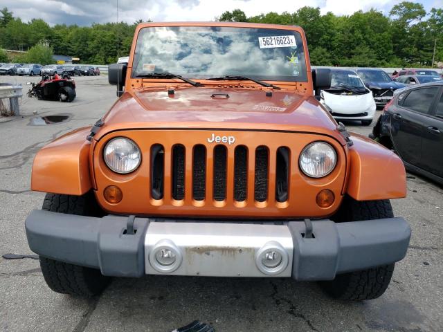 Photo 5 from auction – 2011 JEEP WRANGLER U with VIN 1J4HA5H12BL558034